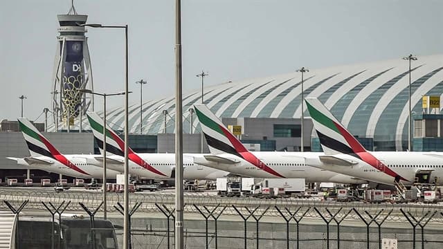 Dubai Suspends Flights as Trump Demands Help With Hormuz